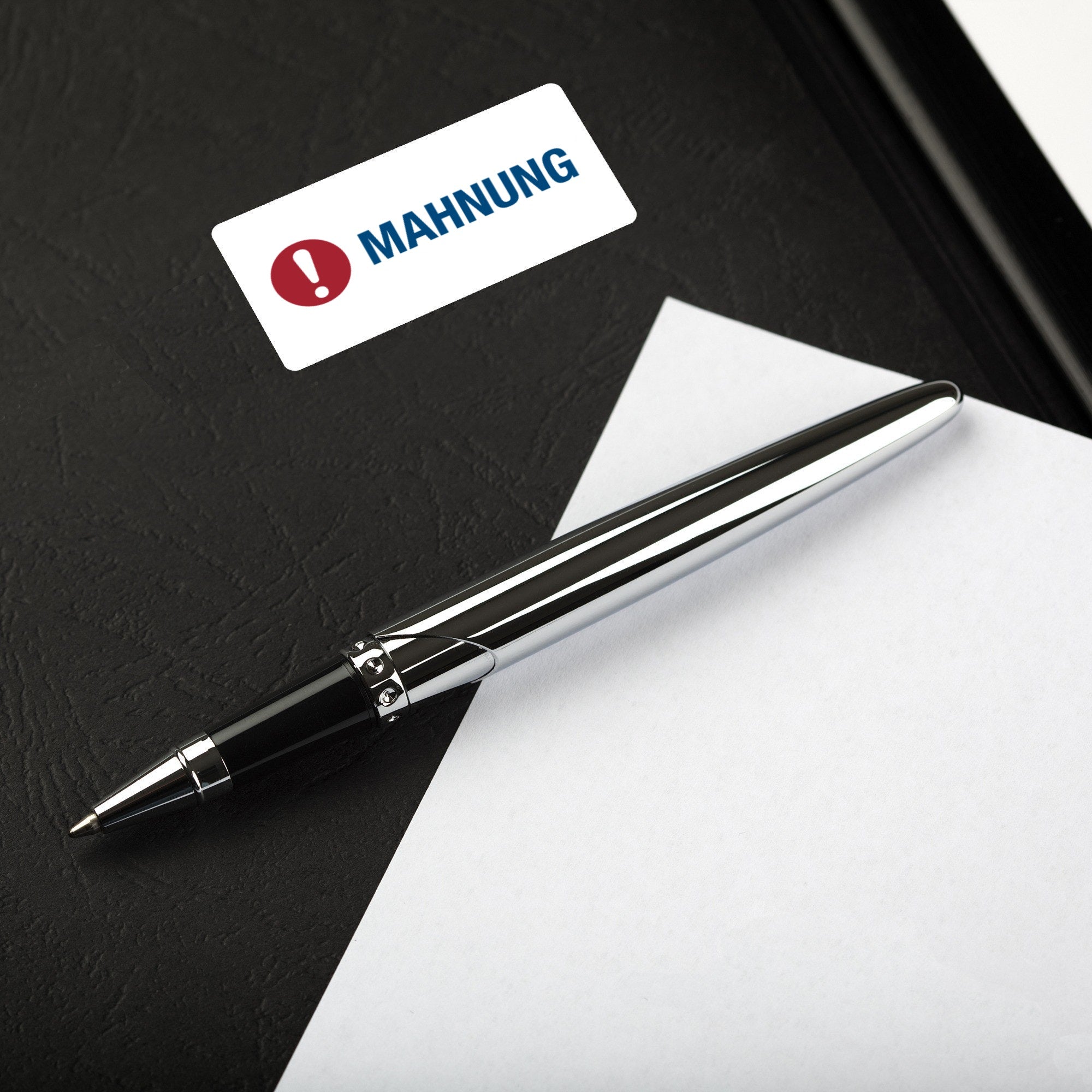 Aufkleber mit Piktogramm "Mahnung" auf 60x30 mm Rollenetikett, 250 Stück, für Kennzeichnung und Erinnerung.
