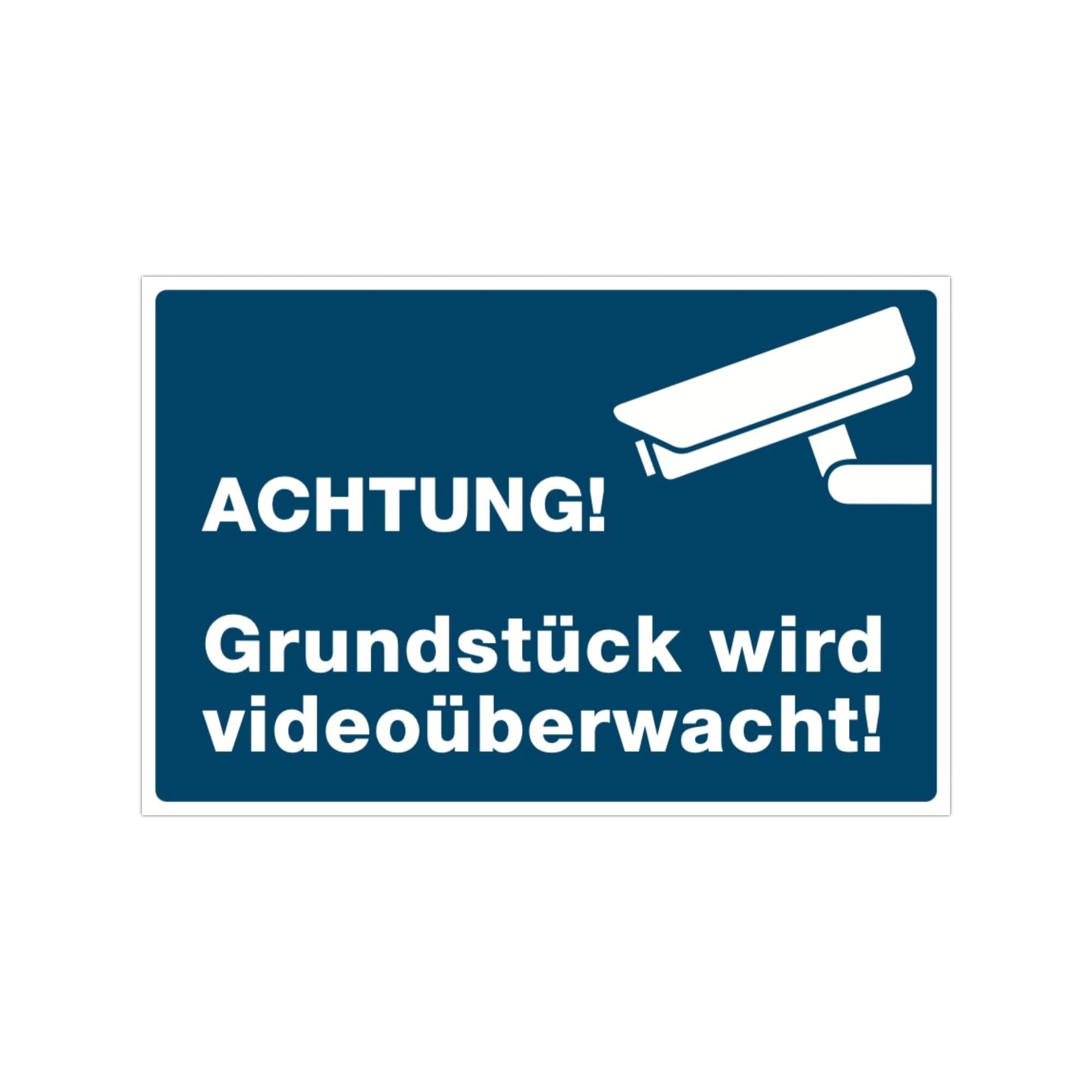 Drei blaue Aufkleber "Achtung! Grundstück wird videoüberwacht!" mit 300x200 mm Größe, für Sicherheit und Überwachung, auf glattem Untergrund.