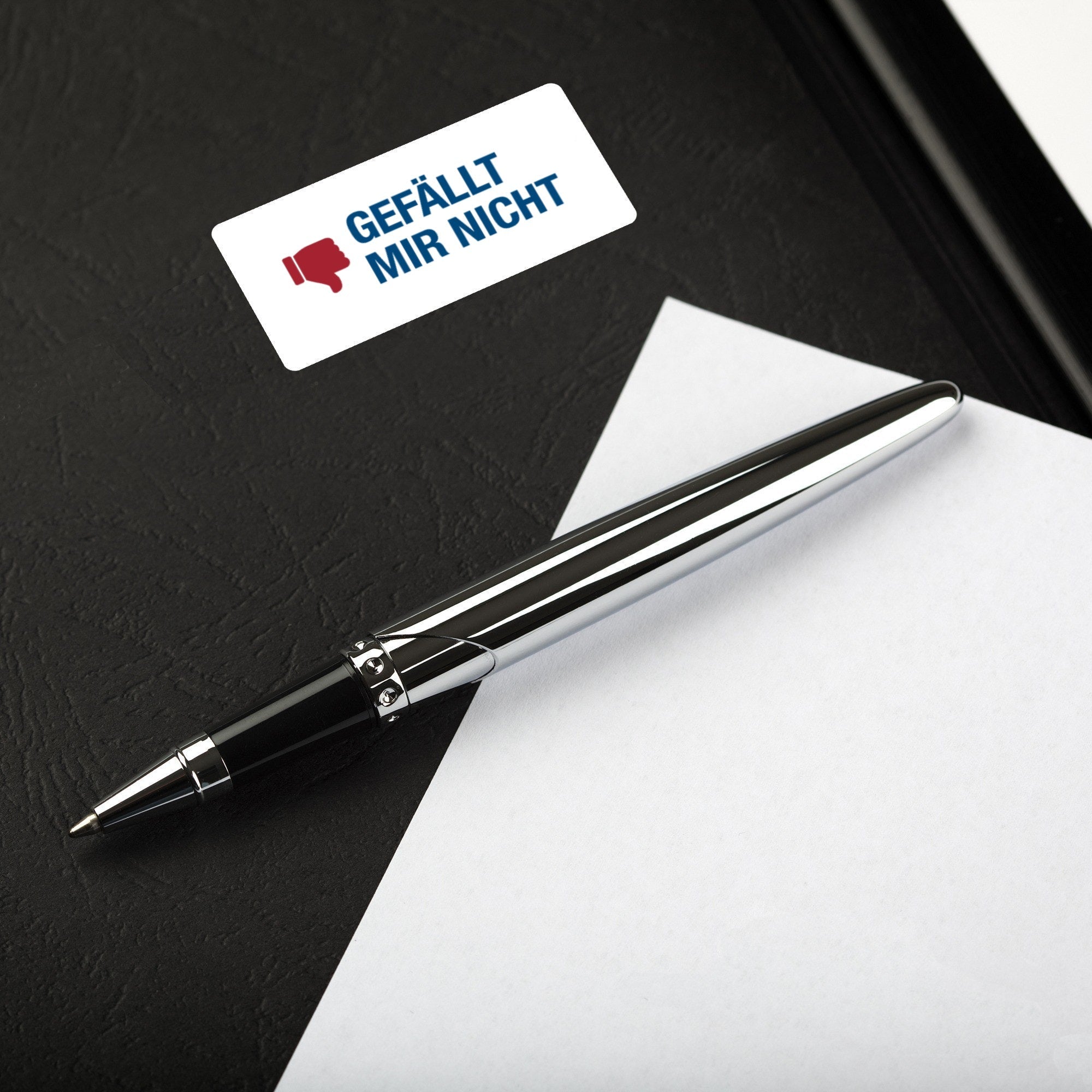 Aufkleber mit Piktogramm "Gefällt mir nicht" auf Rollenetiketten, 60x30 mm, 250 Stück, von aufkleberdrucker.de