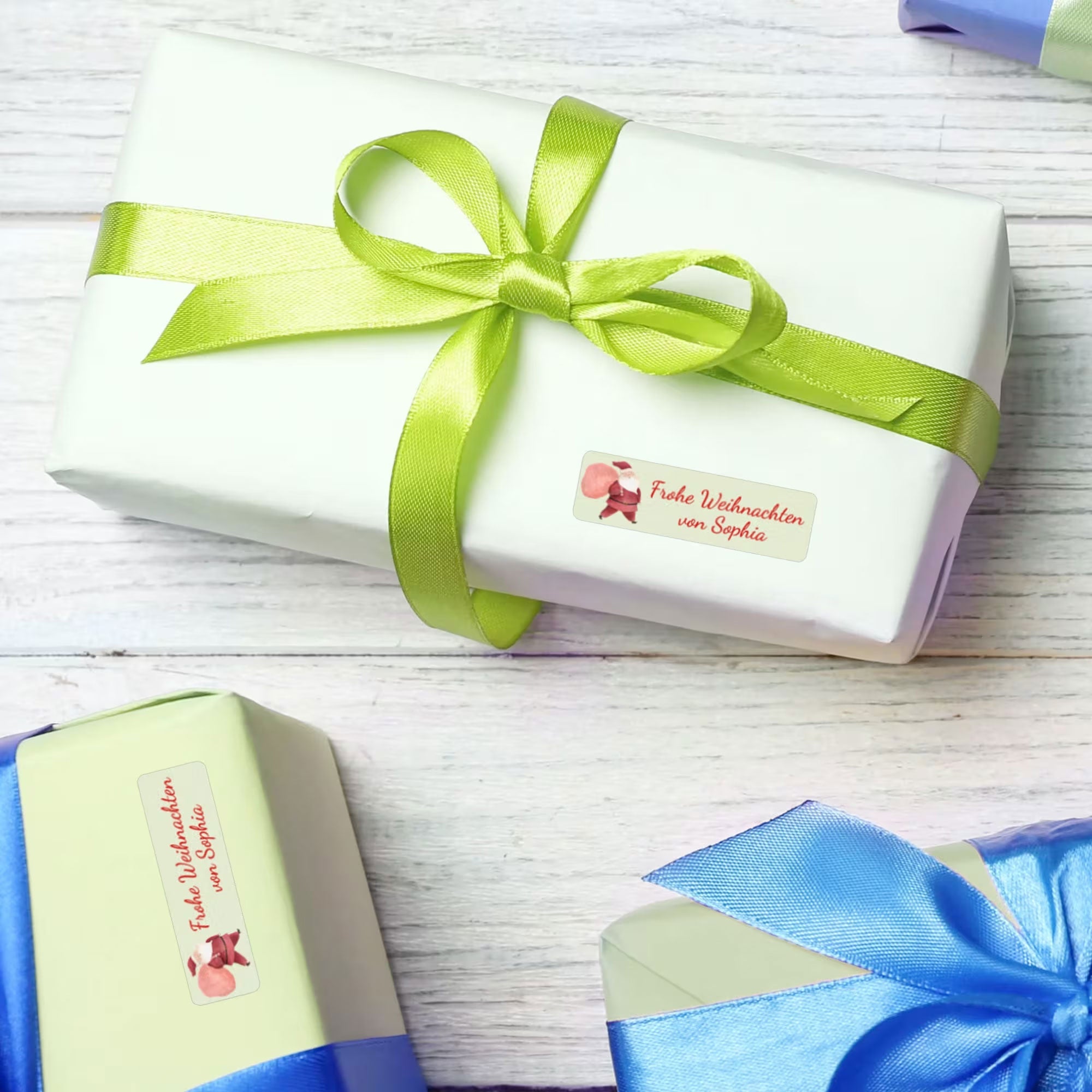 Aquarell Namensaufkleber in 3- oder 4-zeiliger Gestaltung, 110 Stück, 50x15 mm, mit bunten Aquarell-Designs auf weißem Hintergrund.