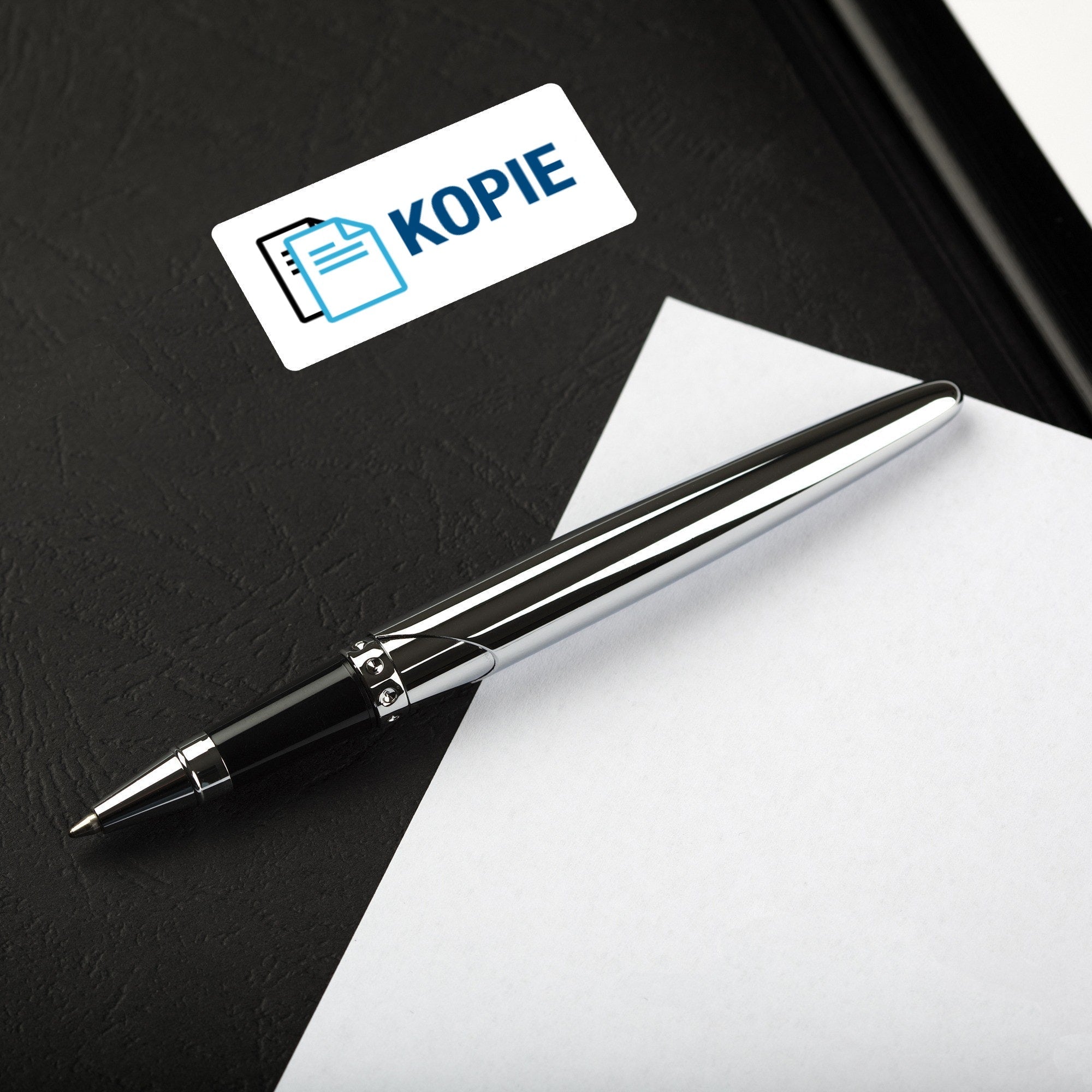 Aufkleber mit Piktogramm "Kopie" auf 60x30 mm Rollenetikett, 250 Stück, klarer Druck in deutscher Sprache.