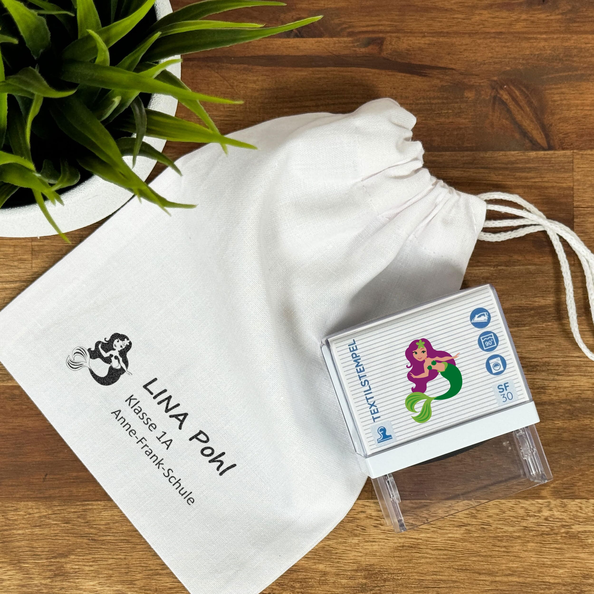 Textilstempel für Kinder mit Meerjungfrau-Motiv und Personalisierung, 47 x 18 mm, von stempel-fabrik.de
