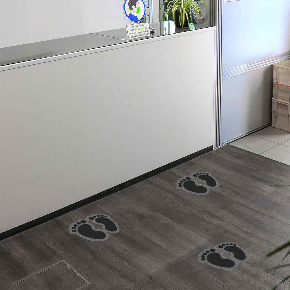 Kinderfuß-Fußbodenaufkleber in Schwarz, Paar, ca. 170x125 mm, ideal für Spielbereiche und Kinderzimmer.